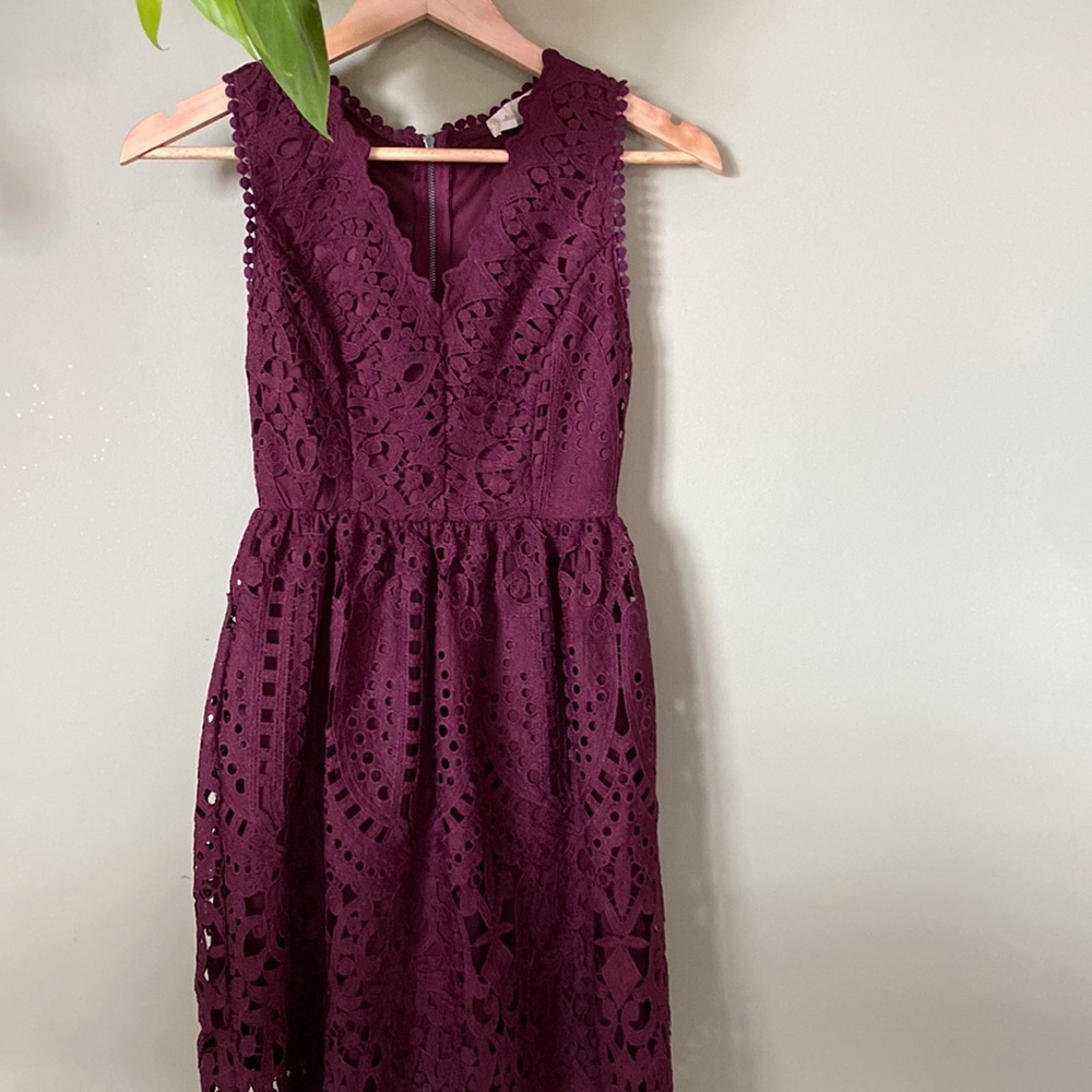 Burgundy/dark purple dress from altar’s state